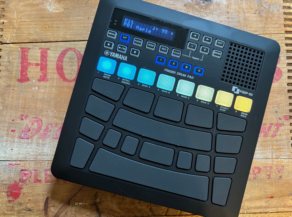 YAMAHA FGDP-50 Finger Drum Pad, pictured on top of vintage beverage crate. 